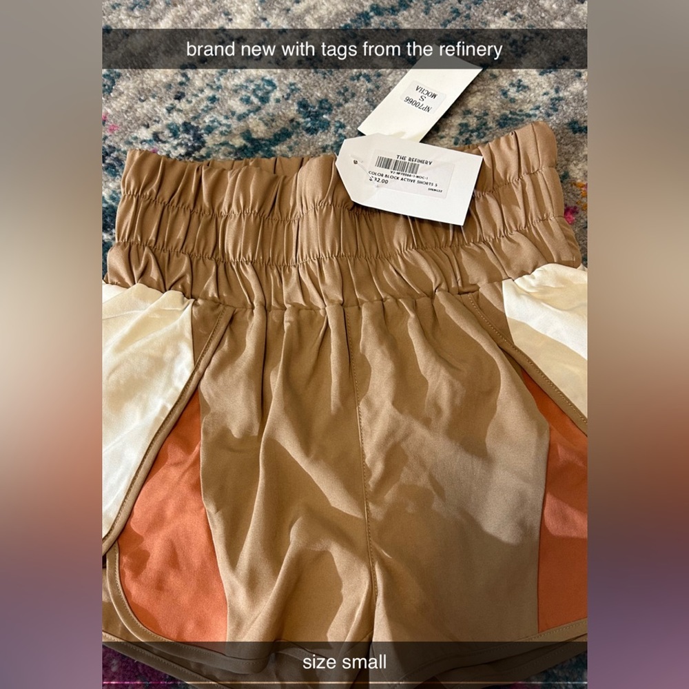 Brand new still with tags athletic shorts from a boutique, size small!
